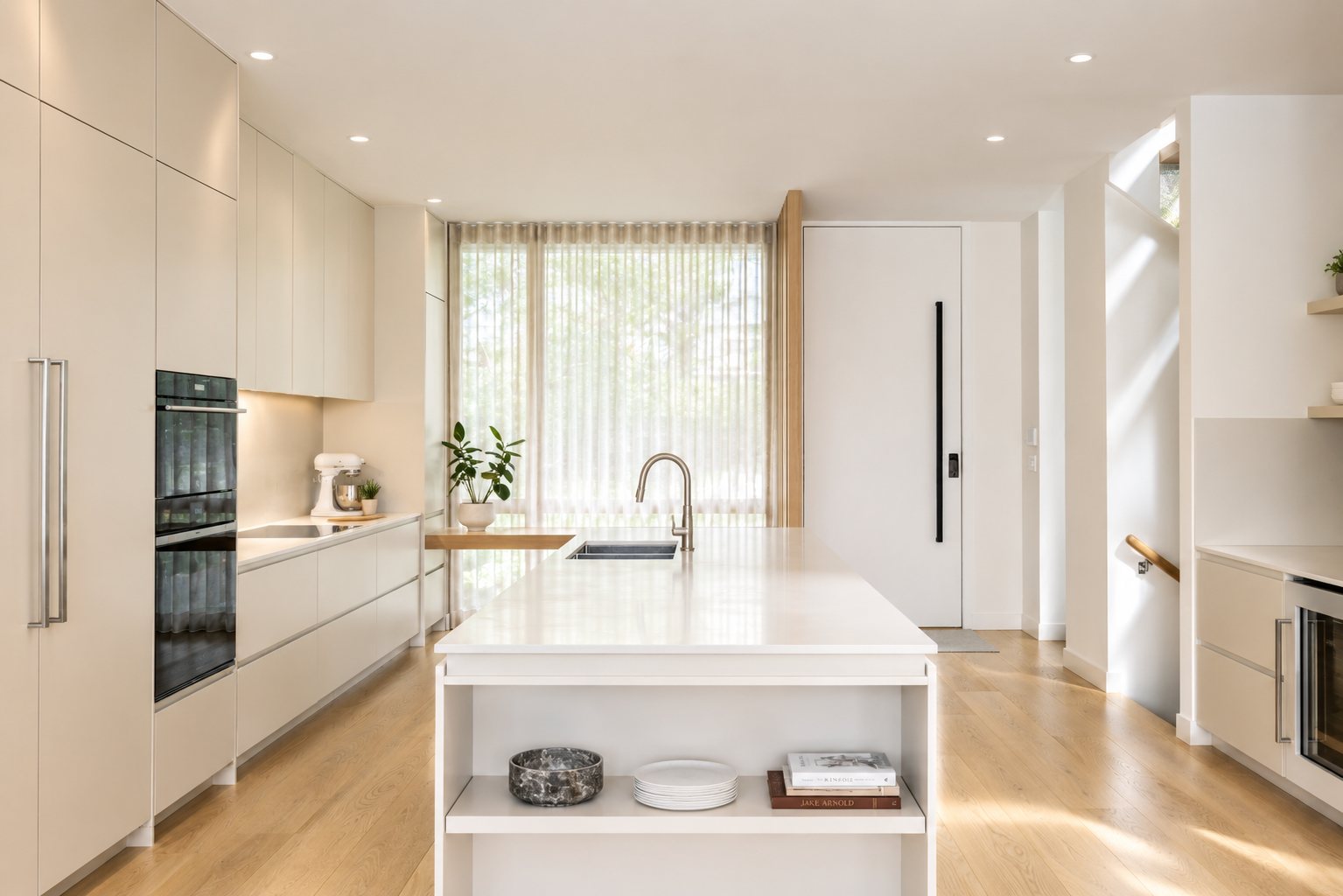 Kitchen island looking through to the entry
